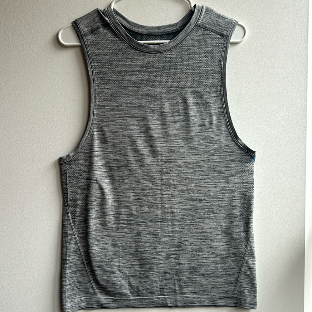 Lululemon medium grey vented drop tank, like new. No damage or stain